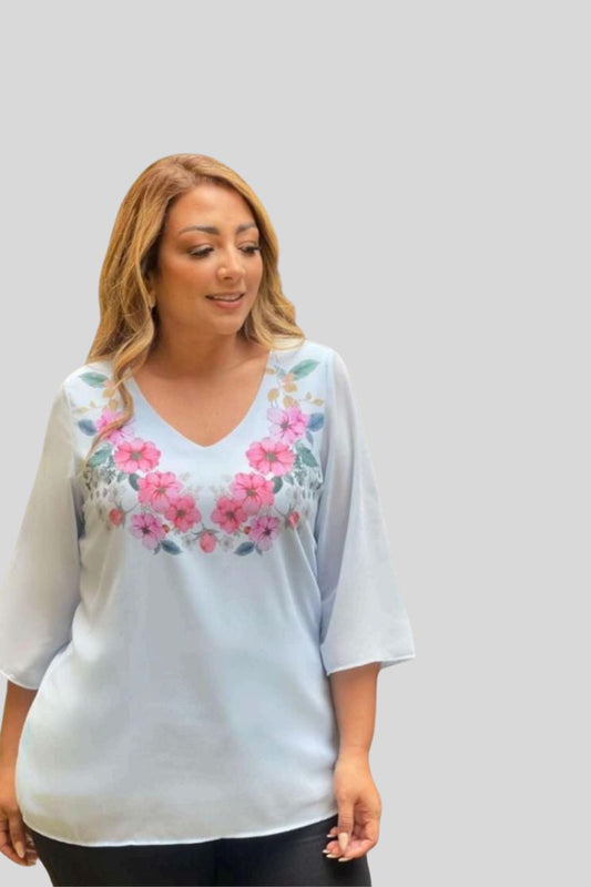 BLUSA CON ESTAMPADO EN FLORES